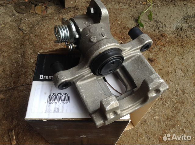 Суппорт задний правый Nissan Premiera P12