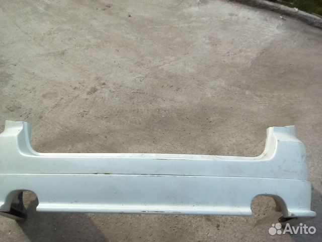 Бампер задний 57704-AG040 Legacy BLN/BPN