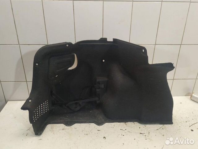 Обшивка багажника левая 857304Y000WK Kia Rio 3 Обшивка багажника левая 857304Y000WK Kia Rio 3