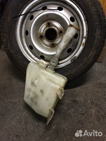 Бачок омывателя Nissan Primera P12 Бачок омывателя Nissan Primera P12