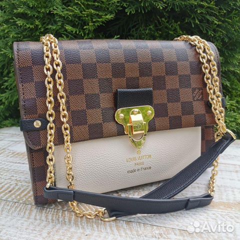Новая женская сумка клатч на цепочке Louis Vuitton Новая женская сумка клатч на цепочке Louis Vuitton