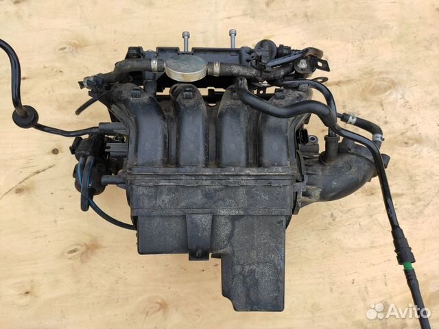 Впускной коллектор Z16XE1 на Opel Astra H Zafira B