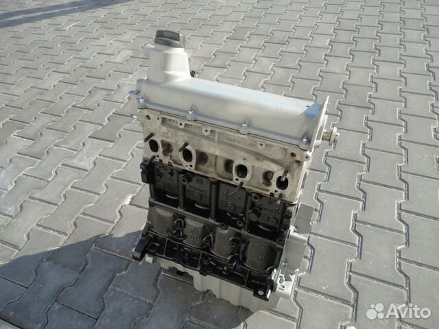 Ат) Двигатель VW t5 AXA