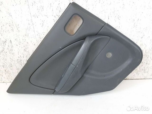 Обшивка двери задняя левая Nissan Almera Classic