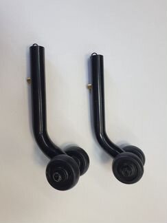 Антиопрокидыватель инвалидной коляски