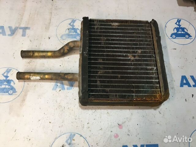 Радиатор отопителя Мазда Демио