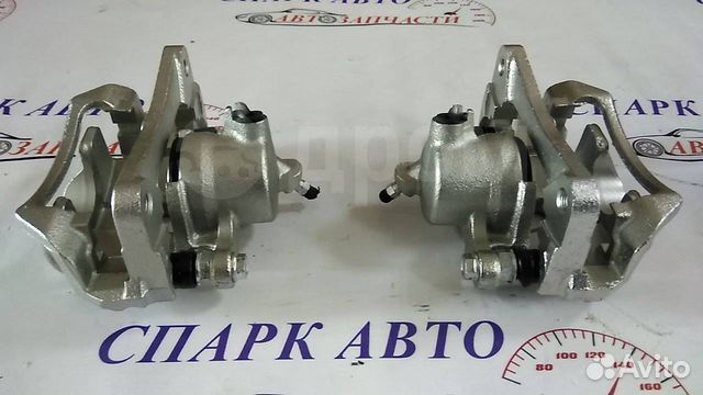 Суппорт задний левый/правый Toyota Land Cruiser