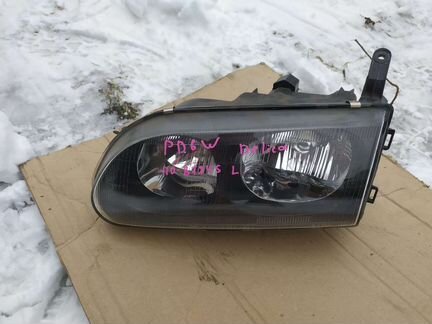 Фара левая Mitsubishi Delica PD6w