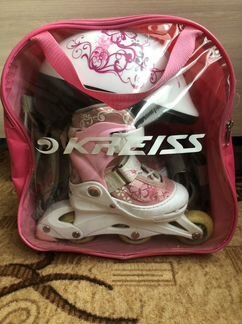 Роликовые коньки