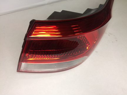 Фонарь левый наружный Киа Рио 4